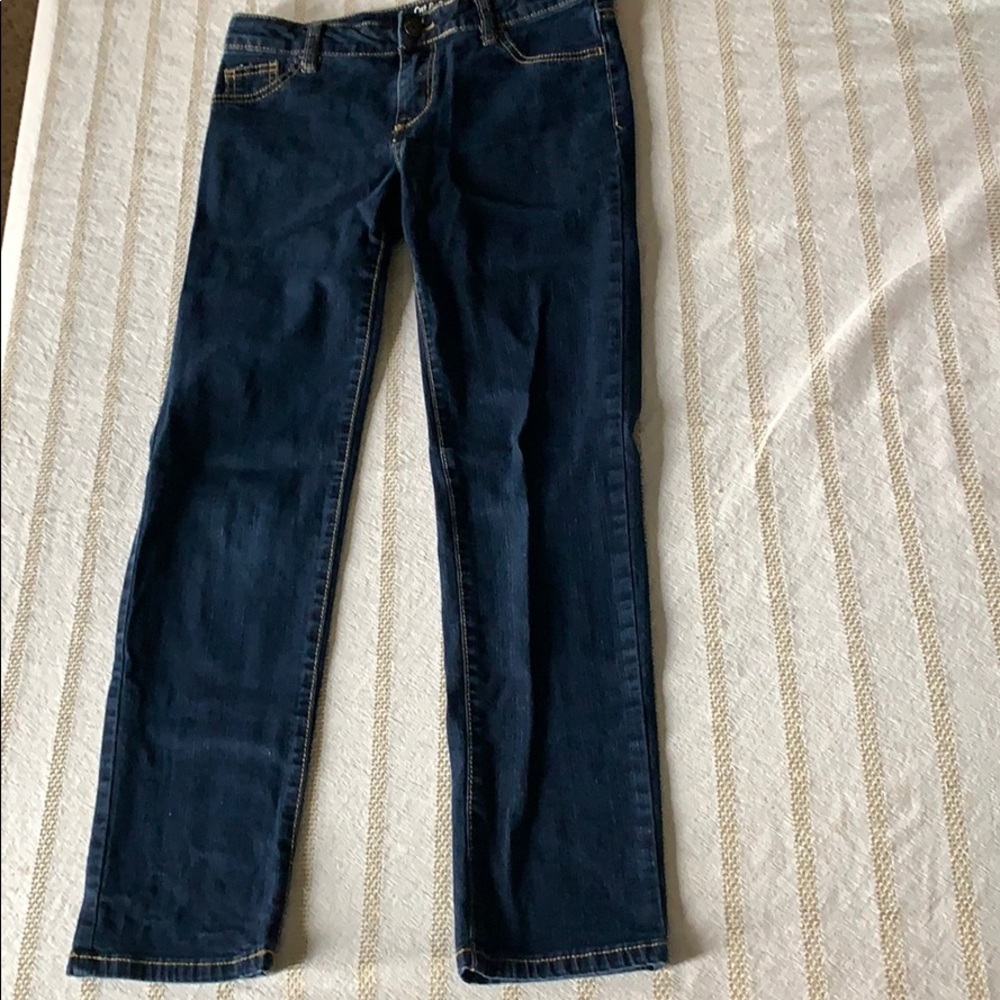 Dark blue jeans with brown stitching